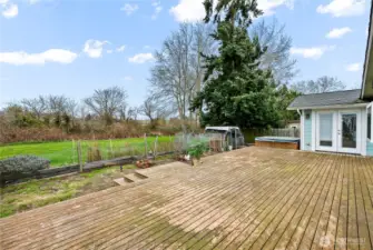 Large back deck with fields beyond