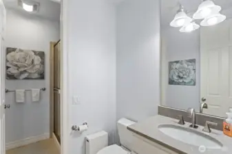 Main floor powder room with shower