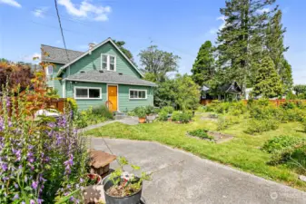 Lots of gardens, fruit trees and beautiful landscaping. Back yard is completely fenced.