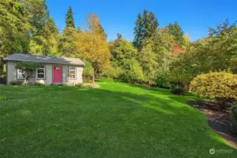 From the house side, the garage looks like a cute cottage!