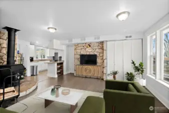 Family Room with wood-burning stove (virtually staged)