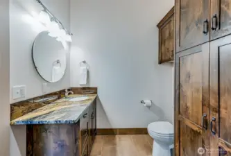 Plenty of storage in the 1/2 bath, too!