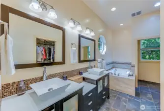 Two sinks?  Two happy people! Never have to wait to brush your teeth AND great conversational space between the sink and tub!