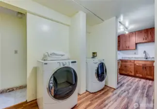 Utility and storage area, complete with your own washer and dryer!  No stairs for your laundry!