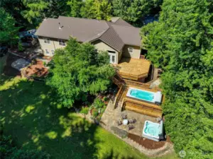 A birds eye view of your oasis!  You don't even have to get your feet dirty to get to the pool or back to the house!  Room to throw a ball and let the pets run.