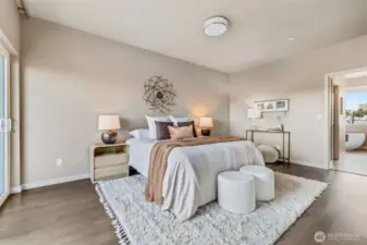 Primary Suite w/ walk-in closet and 5-piece bath