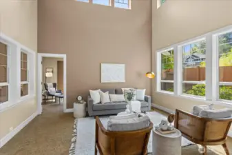 Formal living room with 2-story ceilings off the entry.  Tons of natural light here from so many windows!