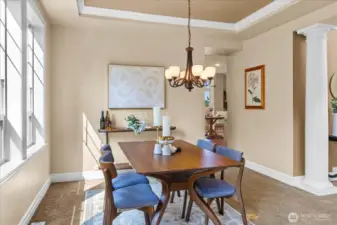 Large formal dining room for entertaining.  Coffered ceilings add a touch of elegance.