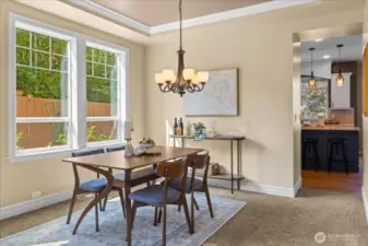 Another view of the dining room with the kitchen beyond ...
