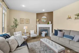 Large family room with corner gas fireplace for those cold PNW nights!