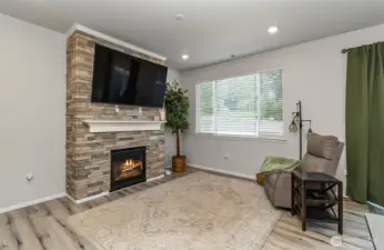 Stone wall w/ gas fireplace