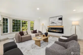 Large family room of the entry with ample space for a sectional and large TV