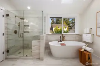Beautifully tiled shower and tub