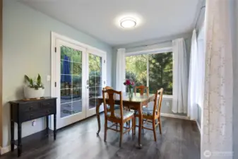 New french doors lead out to the adjacent private deck.