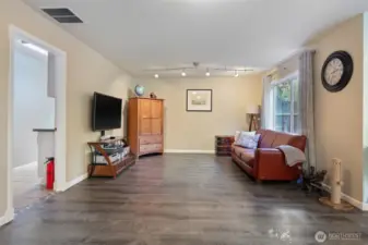 Second living area. Laundry space is through the doorway on the left.