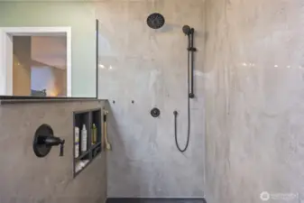HUGE custom walk-in shower with dual niches, rain shower head and shower wand.