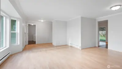 Open living area flows into kitchen/dining