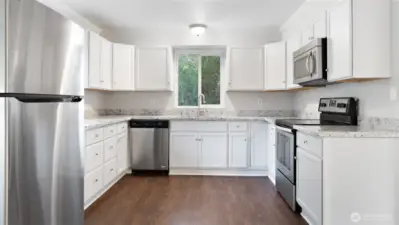 Updated large kitchen w stainless steel appliances