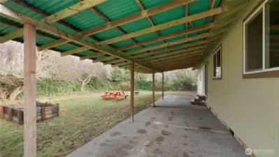 Covered patio made for entertaining (or hot tub?)