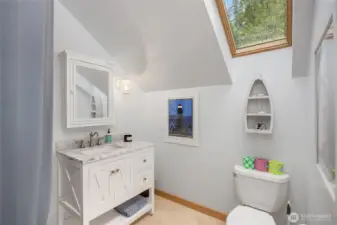 3/4 bath adjoins the upper level bedroom