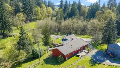 over 14 acres w/ 2 houses