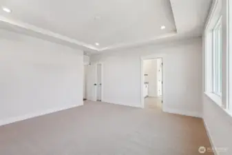 Primary bedroom offers an oversized walk-in closet and 5-piece ensuite bathroom.