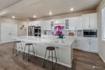 French doors on left open to an oversized walk in pantry.  Plenty of storage!