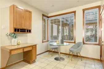 Breakfast nook with a built-in desk area.