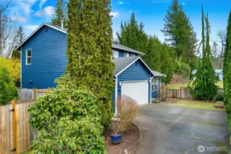 Long driveway for plenty of parking w/ two car garage.