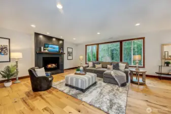 Large "Great Room" Styly Family Room With Gas Fireplace & Luxury Vinyl Plank Flooring.