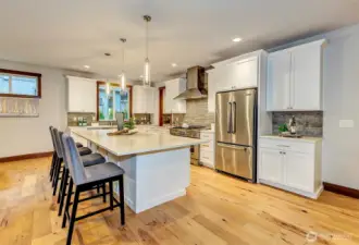 Gourmet Kitchen With High-End Stainless Steel Appliances.