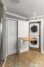 Upstairs utility with folding board