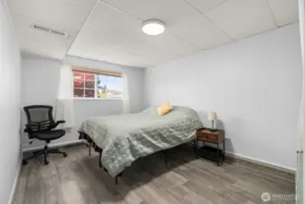 4th Bedroom, in the lower level has new flooring