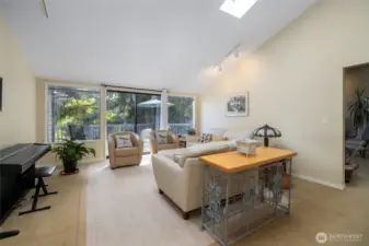 Great room also has a large sliding glass door going out to the deck