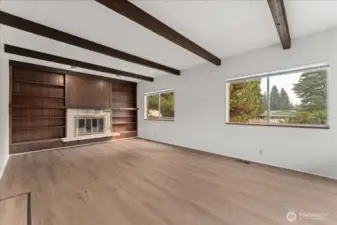 Cozy fireplace and new flooring