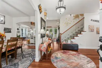 Foyer with brazillian cherry hardwoods in entry and living room