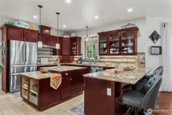 Chef's kitchen with kitchen eating bar