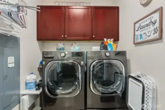 Extended laundry area with new washer & dryer that stays