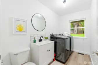 Lower level 1/2 bath + laundry room