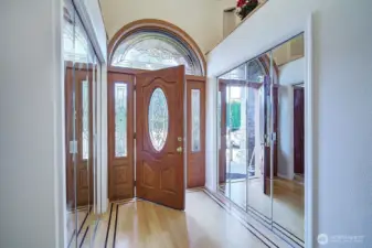 Foyer with art niche shelves and double closets!
