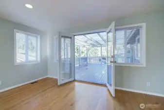 French doors to covered deck from Primary suite.