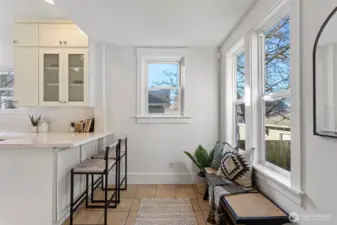 Behind the kitchen is a nice big mud room area where you can have benches and hooks to shed your coats and shoes.