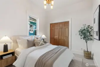 Bedroom #2 on the main floor features new carpeting, an extra large closet and new carpeting and paint.