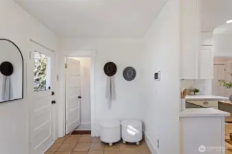 Mud room area and door to back deck and yard.