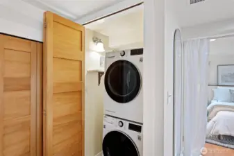 Newer front loading washer and dryer are included in the sale and conveniently located next to the walk-in closet.