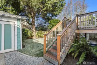 Stairway to back deck makes an easy back entry into the home and mud room.  The stairs and deck have been recently refinished with all weather decking surfaces.