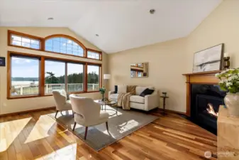 The warmth of the cherry wood floors compliment the natural PNW scenes outside the windows.