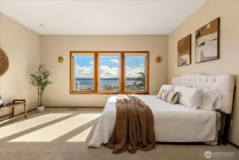 Imagine waking up here! Enjoy coffee or a book from bed and never lose sight of the views.