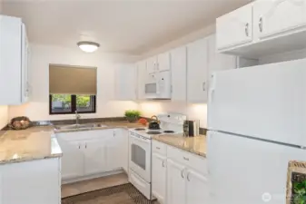 A fully outfitted kitchen that goes with the Condo. All appliances remain as do dishes and silverware, etc.