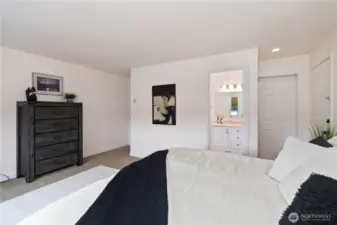 King size bed, tiled floor in bath.
